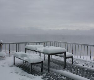 Table and sets covered in 150mm of snow.
