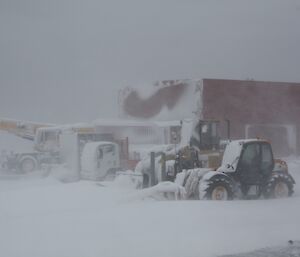 Large equipment covered in snow