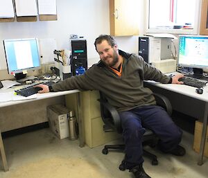 Aaron at his desk working