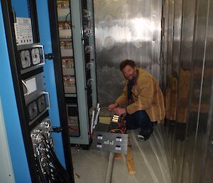 Bob working on science electrical equipment