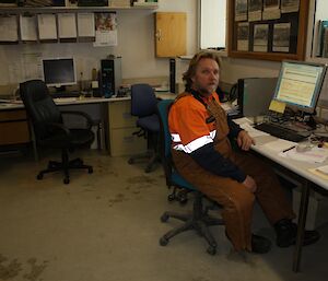 Mal at his desk in the trades workshop