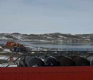 Picture taken from the roof of the summer accommodation building with the fuel storage facility in the foreground and Hiedemann Bay in the background.