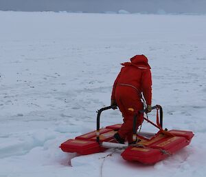 Jeff moving onto the ice walking in the middle of the Rescue Alive unit