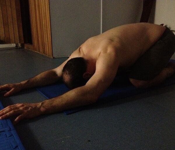 Paul in yoga ‘child’s pose'