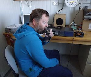 Bob sitting in front of his HAM radio equipment