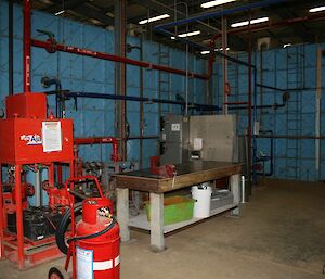 Internal tanks with the fire pump and pipe work painted red and the domestic pipe work painted blue