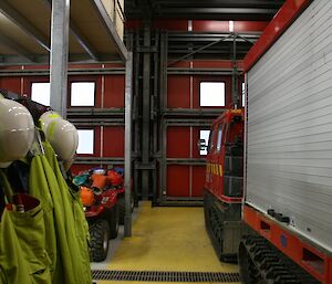 A view of the emergency vehicles from the back looking towards the large vehicle exit doors