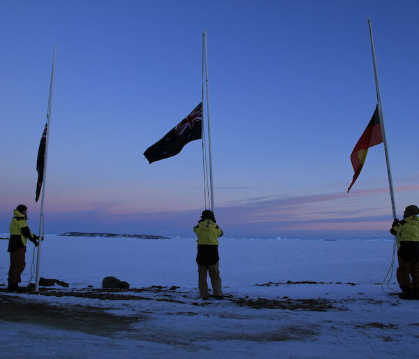 Mark, Aaron and Col Raise the Australian, Aboriginal and New Zealand flags