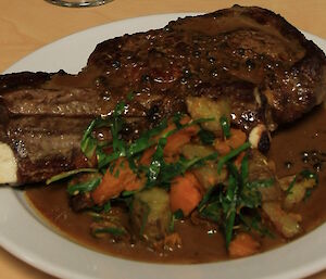 Fresh herbs from hydroponics add colour to steak and vegetables