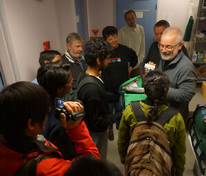 Doc Mal shows some visitors from the Indian station through the stations medical facilities