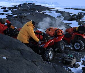 Jeff working on the quad bikes to get them going in the cold