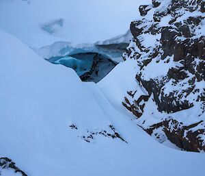 A bridge of ice creates a snow cave