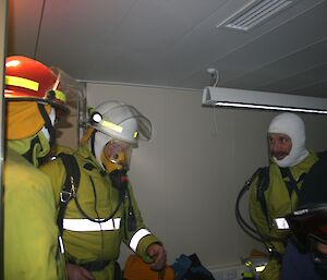 The fire chief giving final instructions while the BA team get ready to don their BA set