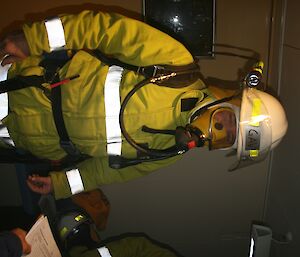 Expeditioner in fire fighting and BA gear