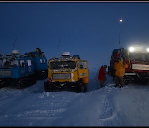 Red, blue and yellow Hägglunds parked up at Whoop Whoop skiway