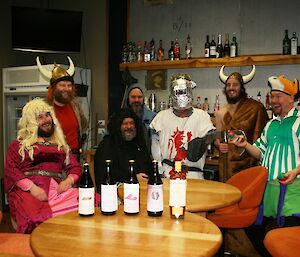 The guys who dressed up around the tasting table