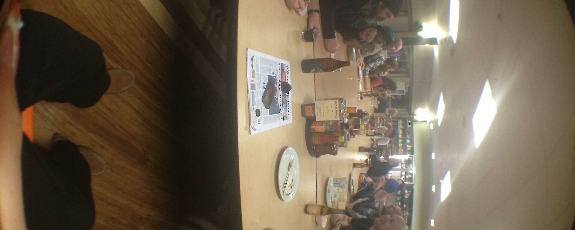 A fisheye view of the busy dinner table in the Living Quarters