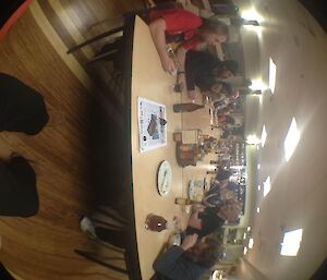 A fisheye view of the busy dinner table in the Living Quarters