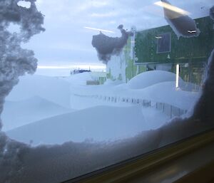 Looking out of the snow framed mess window at even more snow outside