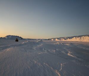 Standing on the sea ice looking east along the glacier edge