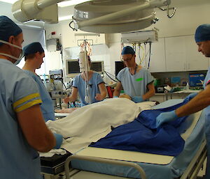 Expeditioners and doctor during theatre training with hospital staff at Hobart hospital facility
