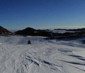 A panoramic view of the Rauers group of islands with the red Hagglund off in the distance