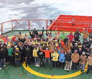 All the new Davis Expeditioners posing for a group photo on the helideck