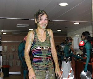 A wet female expedtioner after she was inducted by King Neptune