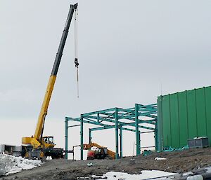 Steel framework going up for a new building at Davis