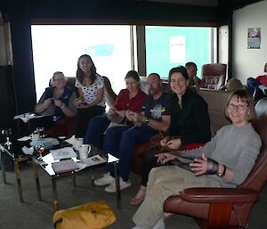 A group of expeditioners knitting