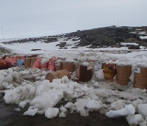 Fuel drums covered in snow at Davis Station