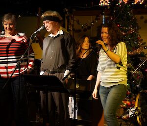 Three singers with the Davis Band