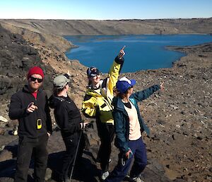 Expeditioners pointing in different direction