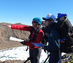 Expeditioners using maps