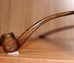 A wooden hand-made pipe