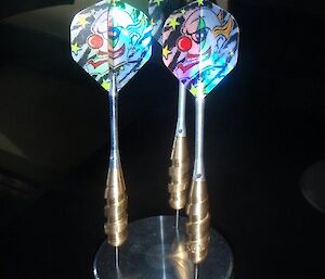 A set of metal darts