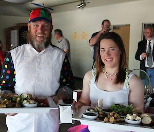 Two expeditioners with serving trays