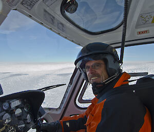 close up of a pilot in his helicopter