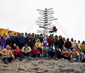 large group of people facing camera for end of season photo