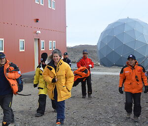 group of expeditioners touring station