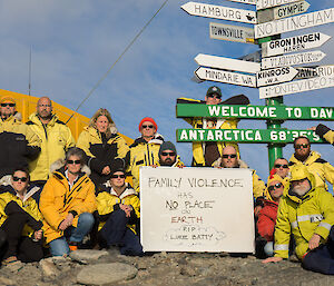 group photo of Davis team demonstrting against family violence