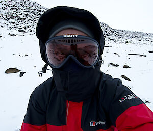 Close up self-photo of an expeditioner wearing googles