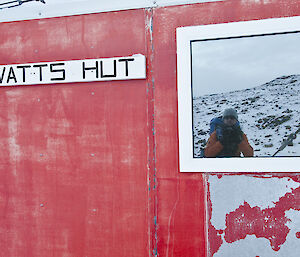 Reflection of Stu in the window at Watts hut