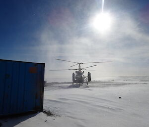 Large helicopter lands on the heli pad