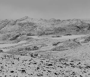 parorama photo of snow capped hills