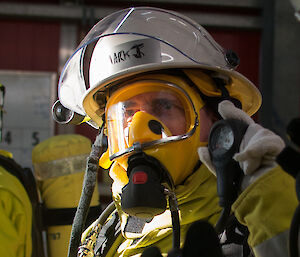 Expeditioner wearing breathing aparatus mask