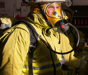 Close up photo of an expeditioner wearing breathing mask