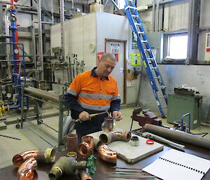 Expeditioner at his work bench