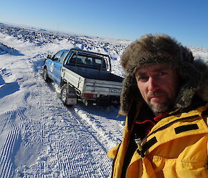 Expeditioner takes photo of himself and the bogged ute