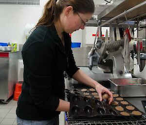 Expeditioner in the kitchen making easter eggs